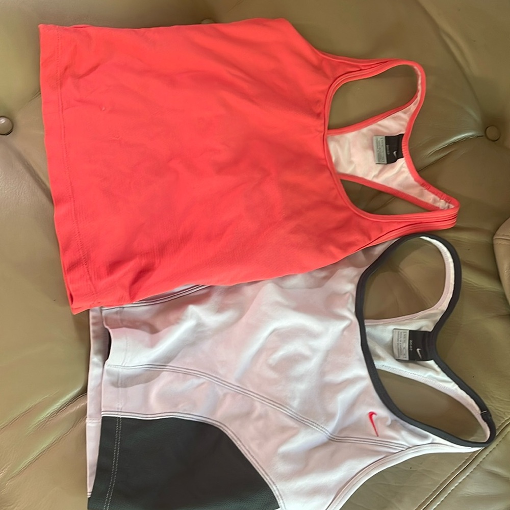 2 Nike tank tops size 4-6 and M